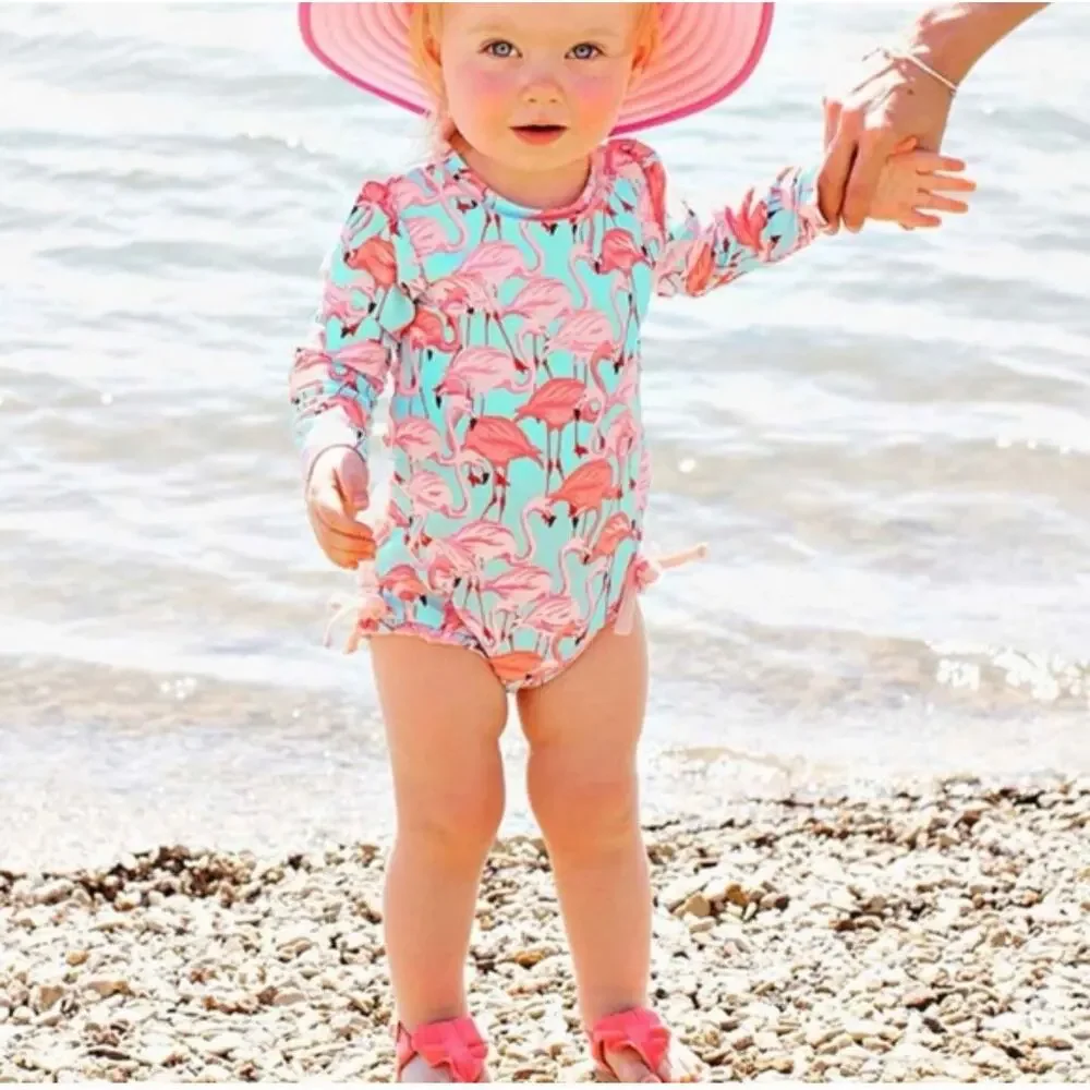 RuffleButts Vibrant Flamingo Long Sleeve One Piece Rash Guard Swimsuit 18-24 MO